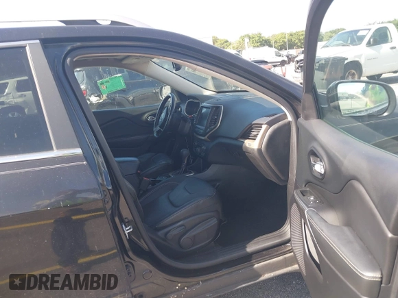 2014 Jeep Cherokee Limited with VIN 1C4PJLDS9EW217074, listed as a IAAI auction lot 42705468 with 144,007 mi miles and . Bid and sale history available at DreamBid. Image 5.
