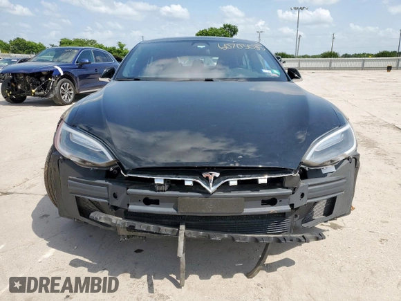 2016 Tesla Model S 90D с VIN 5YJSA1E21GF168439, выставлен на аукционе Copart как лот 60703035 с пробегом 102 905 миль миль и Списание • Salvage title. История ставок и продаж доступна на DreamBid. Изображение 5.