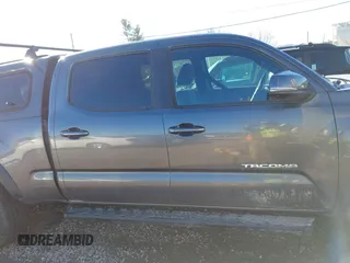 2021 Toyota Tacoma 4WD SR5 with VIN 5TFDZ5BN8MX058531, listed as a IAAI auction lot 41628820 with 102,004 mi miles. Bid and sale history available at carsss.com. Image 13.