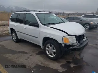 2008 GMC Envoy SLE2 with VIN 1GKDT13S482144358, listed as a IAAI auction lot 41797841 with 123,287 mi miles. Bid and sale history available at carsss.com. Image 1.