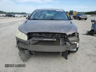 2011 Buick LaCrosse CXL with VIN 1G4GC5ED3BF256501, listed as a Copart auction lot 56976895 with 223,600 mi miles and Salvage title. Bid and sale history available at DreamBid. Image 5.