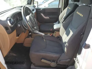 2013 Jeep Wrangler Sahara with VIN 1C4AJWBG0DL517849, listed as a Copart auction lot 58392505 with 119,499 mi miles and Clean title. Bid and sale history available at DreamBid. Image 7.