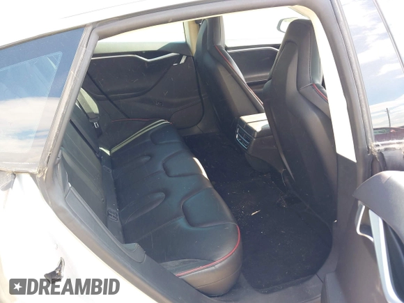 2012 Tesla Model S Performance with VIN 5YJSA1DP3CFP01348, listed as a IAAI auction lot 42185490 with 181,217 mi miles and . Bid and sale history available at DreamBid. Image 8.