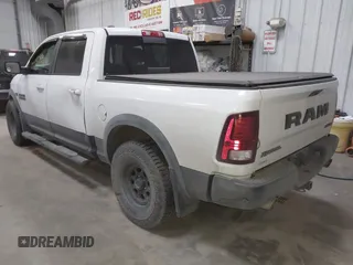 2016 Ram 1500 Rebel z VIN 1C6RR7YT6GS108472, wystawiony jako IAAI lot #41761560 z przebiegiem 101 132 mil mil oraz . Historia ofert i sprzedaży dostępna na DreamBid. Obrazek 3.