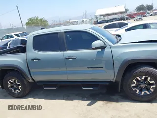 2022 Toyota Tacoma SR with VIN 3TYCZ5AN0NT104300, listed as a IAAI auction lot 42652503 with 18,071 mi miles and . Bid and sale history available at DreamBid. Image 14.