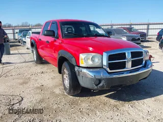 2005 Dodge Dakota SLT with VIN 1D7HE48N65S320064, listed as a IAAI auction lot 41276075 with 183,949 mi miles. Bid and sale history available at carsss.com. Image 1.