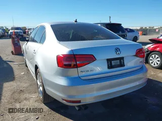 2015 Volkswagen Jetta SE z VIN 3VWD07AJ6FM326731, wystawiony jako IAAI lot #41066250 z przebiegiem 63 242 mil mil oraz . Historia ofert i sprzedaży dostępna na DreamBid. Obrazek 3.