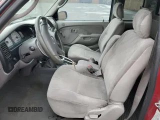 2003 Toyota Tacoma z VIN 5TEVL52N03Z216695, wystawiony jako Copart lot #53515775 z przebiegiem 154 636 mil mil oraz Szkoda całkowita • Salvage title. Historia ofert i sprzedaży dostępna na DreamBid. Obrazek 7.