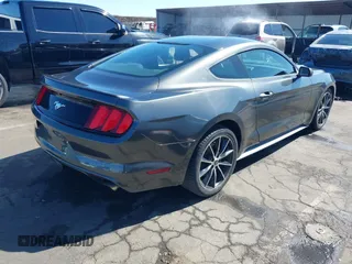 2016 Ford Mustang EcoBoost with VIN 1FA6P8TH9G5257358, listed as a IAAI auction lot 42315924 with Not provided miles and . Bid and sale history available at DreamBid. Image 4.