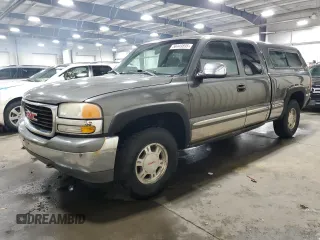 2001 GMC Sierra 1500 Work Truck z VIN 2GTEK19V111400823, wystawiony jako Copart lot #58449895 z przebiegiem 306 504 mil mil oraz Czysty tytuł • Clean title. Historia ofert i sprzedaży dostępna na DreamBid. Obrazek 1.