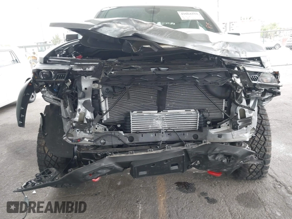 2024 Chevrolet Colorado 4WD ZR2 with VIN 1GCPTFEK9R1177298, listed as a IAAI auction lot 42064294 with 3,827 mi miles and . Bid and sale history available at DreamBid. Image 6.