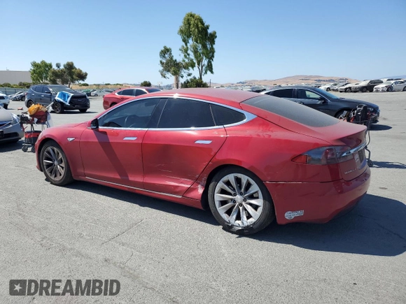 2016 Tesla Model S 70 with VIN 5YJSA1E19GF147460, listed as a Copart auction lot 64068545 with 99,201 mi miles and Salvage title. Bid and sale history available at DreamBid. Image 2.