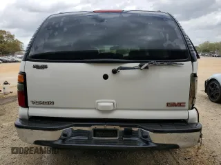 2005 GMC Yukon SLT with VIN 1GKEC13Z45J204402, listed as a Copart auction lot 51697595 with 242,881 mi miles and Salvage Title. Bid and sale history available at carsss.com. Image 6.