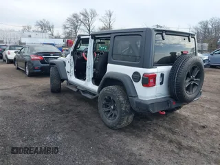 2021 Jeep Wrangler Unlimited Sport S with VIN 1C4HJXDN0MW612698, listed as a IAAI auction lot 41649323 with 22,539 mi miles and . Bid and sale history available at DreamBid. Image 3.