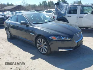 2014 Jaguar XF V6 SC with VIN SAJWJ0EF9E8U31032, listed as a IAAI auction lot 42046036 with 118,927 mi miles. Bid and sale history available at carsss.com. Image 1.