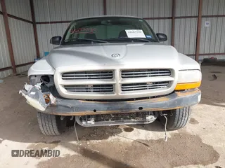 2002 Dodge Dakota z VIN 1B7FL36X42S532446, wystawiony jako IAAI lot #41683398 z przebiegiem 245 626 mil mil oraz . Historia ofert i sprzedaży dostępna na DreamBid. Obrazek 12.
