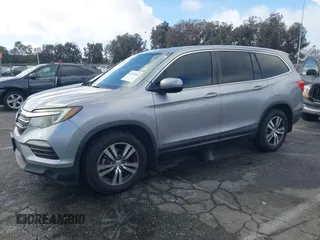 2016 Honda Pilot EX-L with VIN 5FNYF5H57GB038349, listed as a IAAI auction lot 41378569 with 117,651 mi miles and . Bid and sale history available at DreamBid. Image 14.