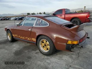 1975 Porsche 911 with VIN 9115201599, listed as a Copart auction lot 79267654 with 69,699 mi miles and Salvage title. Bid and sale history available at DreamBid. Image 2.