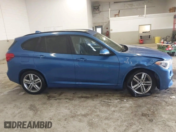 2019 BMW X1 xDrive28i with VIN WBXHT3C53K5L36690, listed as a IAAI auction lot 42012992 with 70,339 mi miles. Bid and sale history available at carsss.com. Image 13.