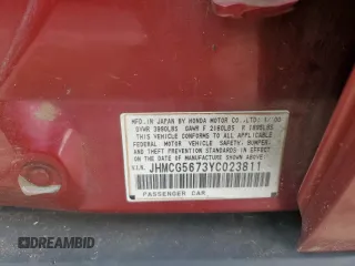 2000 Honda Accord SE with VIN JHMCG5673YC023811, listed as a Copart auction lot 56331885 with 194,416 mi miles and Salvage title. Bid and sale history available at DreamBid. Image 12.