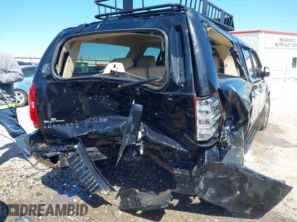 2011 Chevrolet Suburban LTZ with VIN 1GNSKKE33BR380376, listed as a IAAI auction lot 41825445 with 228,715 mi miles and . Bid and sale history available at DreamBid. Image 4.