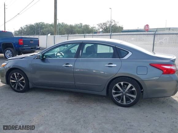 2016 Nissan Altima 2.5 SL with VIN 1N4AL3APXGC246190, listed as a IAAI auction lot 41452833 with 120,789 mi miles. Bid and sale history available at carsss.com. Image 14.