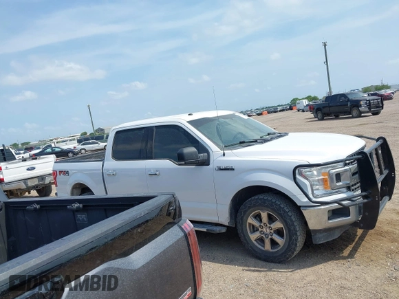 2018 Ford F-150 XL with VIN 1FTEW1E59JKF84452, listed as a IAAI auction lot 42175251 with 161,952 mi miles and . Bid and sale history available at carsss.com. Image 13.