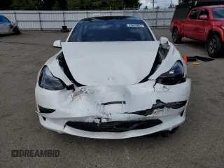 2023 Tesla Model 3 Long Range with VIN 5YJ3E1EB1PF603100, listed as a Copart auction lot 54945865 with 22,865 mi miles and Salvage Title. Bid and sale history available at DreamBid. Image 5.