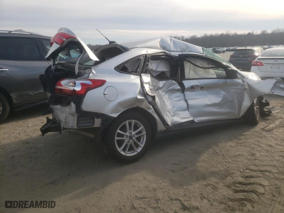 2017 Ford Focus SE with VIN 1FADP3F23HL327032, listed as a Copart auction lot 42398055 with 123,453 mi miles and Salvage Title. Bid and sale history available at carsss.com. Image 3.