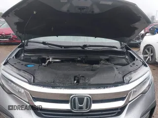 2019 Honda Pilot Touring 8-Passenger with VIN 5FNYF6H98KB097105, listed as a IAAI auction lot 42353009 with 133,212 mi miles and . Bid and sale history available at DreamBid. Image 10.