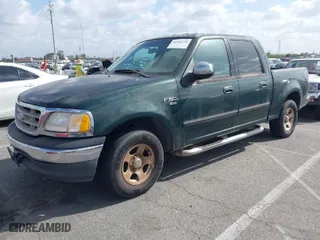 2001 Ford F-150 SuperCrew XLT with VIN 1FTRW07WX1KA43606, listed as a IAAI auction lot 41956736 with 278,543 mi miles. Bid and sale history available at carsss.com. Image 2.