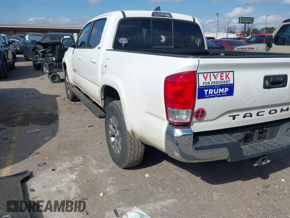 2017 Toyota Tacoma SR5 with VIN 5TFAZ5CN8HX043633, listed as a IAAI auction lot 41520703 with 104,711 mi miles and . Bid and sale history available at DreamBid. Image 3.
