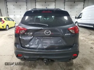 2016 Mazda CX-5 Touring with VIN JM3KE4CY9G0790872, listed as a Copart auction lot 54868385 with 82,569 mi miles and Clean Title. Bid and sale history available at carsss.com. Image 6.