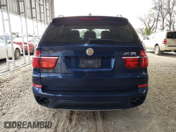2012 BMW X5 35i z VIN 5UXZV4C58CL756913, wystawiony jako Copart lot #51746195 z przebiegiem 160 295 mil mil oraz Szkoda całkowita • Salvage title. Historia ofert i sprzedaży dostępna na DreamBid. Obrazek 6.