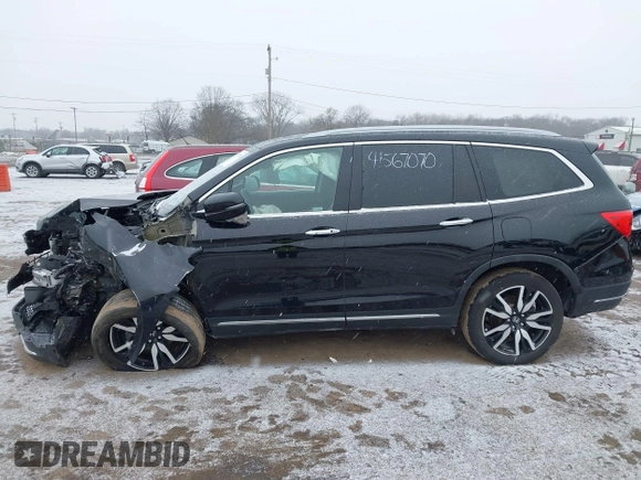 2021 Honda Pilot Touring 8-Passenger z VIN 5FNYF6H94MB091384, wystawiony jako IAAI lot #41567070 z przebiegiem 78 330 mil mil oraz . Historia ofert i sprzedaży dostępna na DreamBid. Obrazek 14.