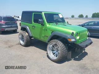 2018 Jeep Wrangler Sport with VIN 1C4GJXAG1JW271695, listed as a IAAI auction lot 42472603 with 105,460 mi miles and . Bid and sale history available at DreamBid. Image 1.