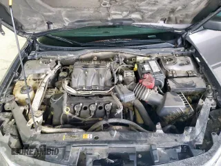 2012 Ford Fusion SEL с VIN 3FAHP0JG9CR263964, выставлен на аукционе Copart как лот 60911215 с пробегом 143 729 миль миль и Списание • Salvage title. История ставок и продаж доступна на DreamBid. Изображение 11.