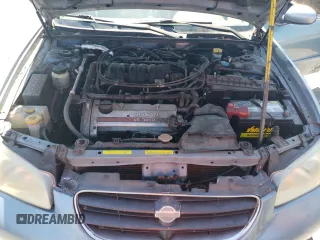 2000 Nissan Maxima GXE z VIN JN1CA31D9YT543874, wystawiony jako Copart lot #69275784 z przebiegiem 214 833 mil mil oraz Szkoda całkowita • Salvage title. Historia ofert i sprzedaży dostępna na DreamBid. Obrazek 11.