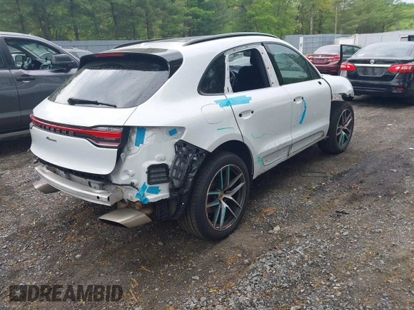 2023 Porsche Macan with VIN WP1AA2A5XPLB21908, listed as a IAAI auction lot 42222633 with 72,779 mi miles and . Bid and sale history available at DreamBid. Image 4.