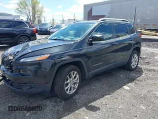 2014 Jeep Cherokee Latitude with VIN 1C4PJMCS8EW257959, listed as a IAAI auction lot 41987529 with 124,749 mi miles. Bid and sale history available at carsss.com. Image 2.