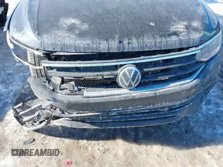 2024 Volkswagen Tiguan SE R-Line Black with VIN 3VV8B7AX3RM158006, listed as a IAAI auction lot 41416903 with 1,735 mi miles and . Bid and sale history available at DreamBid. Image 6.