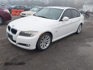 2011 BMW 3 Series 328i xDrive with VIN WBAPK5C56BA662236, listed as a IAAI auction lot 42207015 with 184,118 mi miles and . Bid and sale history available at DreamBid. Image 2.