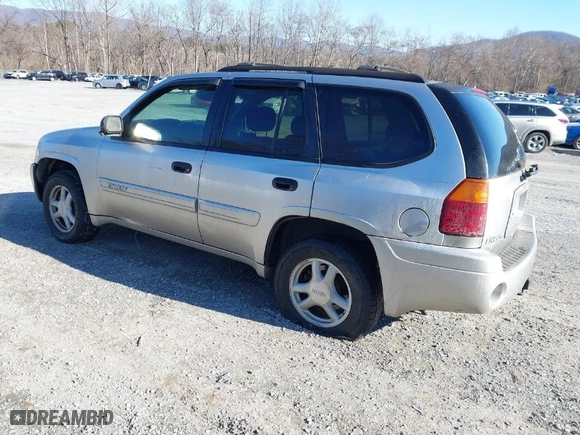 2004 GMC Envoy SLE with VIN 1GKDT13S842134524, listed as a IAAI auction lot 41610041 with 217,166 mi miles. Bid and sale history available at carsss.com. Image 3.