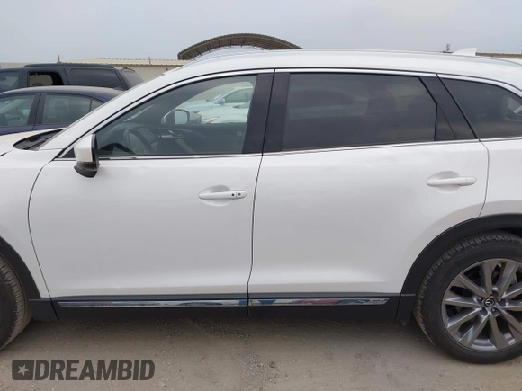2023 Mazda CX-9 Grand Touring с VIN JM3TCBDY0P0634099, выставлен на аукционе IAAI как лот 41943704 с пробегом 5 615 миль миль и . История ставок и продаж доступна на DreamBid. Изображение 14.