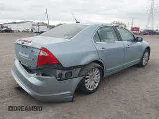 2010 Ford Fusion Hybrid z VIN 3FADP0L36AR200035, wystawiony jako IAAI lot #42145684 z przebiegiem 142 137 mil mil oraz . Historia ofert i sprzedaży dostępna na DreamBid. Obrazek 4.