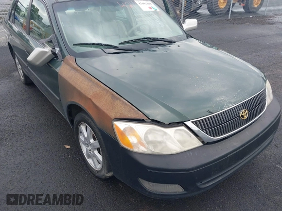 2000 Toyota Avalon XL z VIN 4T1BF28B6YU036865, wystawiony jako IAAI lot #42402305 z przebiegiem 202 265 mil mil oraz . Historia ofert i sprzedaży dostępna na DreamBid. Obrazek 6.