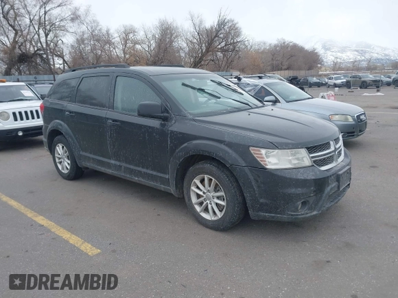 2013 Dodge Journey SXT with VIN 3C4PDCBB2DT561182, listed as a IAAI auction lot 41616065 with 158,542 mi miles. Bid and sale history available at carsss.com. Image 1.