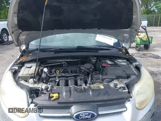 2013 Ford Focus SE with VIN 1FADP3F28DL217636, listed as a IAAI auction lot 42465123 with 187,088 mi miles and . Bid and sale history available at DreamBid. Image 10.