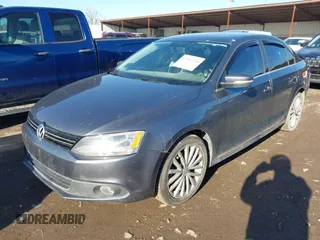2014 Volkswagen Jetta TDI w/Premium with VIN 3VW3L7AJ9EM383295, listed as a IAAI auction lot 41983218 with 105,077 mi miles and . Bid and sale history available at DreamBid. Image 2.