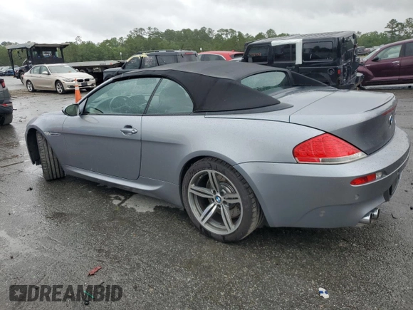 2007 BMW 6 Series M6 z VIN WBSEK93537CS32914, wystawiony jako Copart lot #59816795 z przebiegiem 82 046 mil mil oraz Czysty tytuł • Clean title. Historia ofert i sprzedaży dostępna na DreamBid. Obrazek 2.